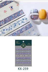 Détail macro du sticker ongles 3D KX-259 avec motifs floraux bleus et oiseaux