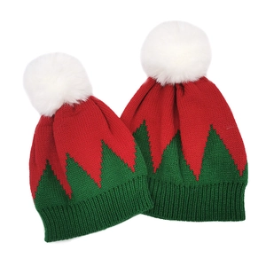 Christmas parent-child knit beanies with fluffy white pom poms for winter warmth