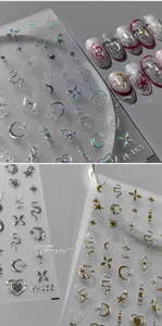 Detail of 3D nail stickers model M-165 with holographic stars, moon, and snakes patterns