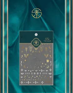 Detail of M-067 nail stickers featuring gold and silver sun, moon and star patterns