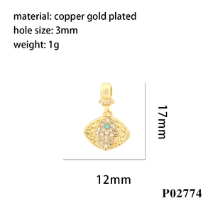 Detailed size view of a gold-plated Hamsa hand pendant with turquoise stone, 17mm x 12mm