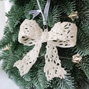 Sparkling white SwanLace bow Christmas tree ornament with glitter lace texture