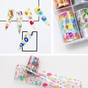 Floral nail foil transfer set with colorful starry flower designs in a clear storage box