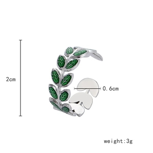 Detail showing silver leaf ring dimensions with green enamel and size measurements