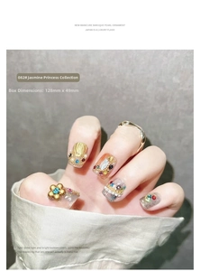 Close-up of Princess Jasmine nail art kit with white pearls and luxury rhinestones