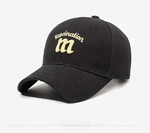 Detailed side view of black baseball cap featuring yellow 3D fascination embroidery