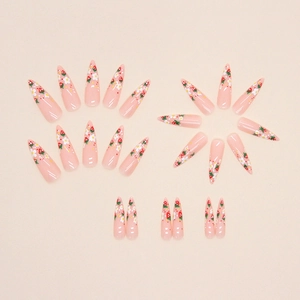 Sweet pink long stiletto press-on nails with cute red strawberry and white flower patterns