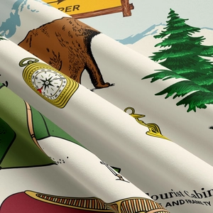 Gros plan du tissu de camping avec motifs vintage d'ours et boussole pour extérieur