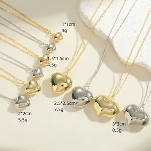 Size comparison of heart pendant necklaces in five dimensions with gold and silver finishes