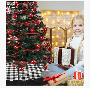 Detail of classic black and white buffalo plaid Christmas tree skirt with decorative trim