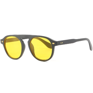 Retro black frame sunglasses with bright yellow lenses in a stylish side view angle