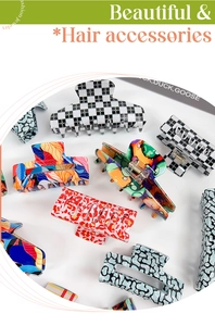 Flat lay of colorful claw clips in checkered, graffiti, and leopard print patterns