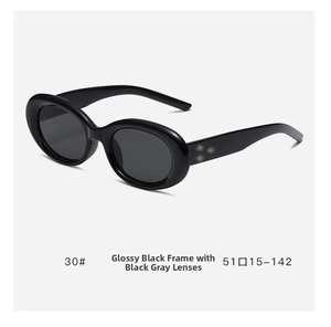 Detail view of oval cat eye sunglasses with glossy black frame and 51▢15-142 size marking