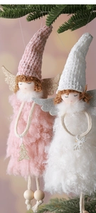 Detail of plush Christmas angel doll with glitter wings and soft knitted hat