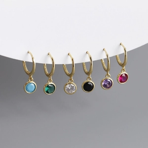 Close-up of S925 sterling silver hoop earrings set with six colors of zircon crystals