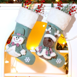 Detailed view of snowman and reindeer 3D Christmas stockings with faux fur cuffs