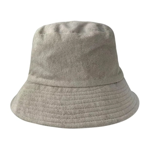 Detail showing grey terry cloth fabric texture and stitching on a bucket hat