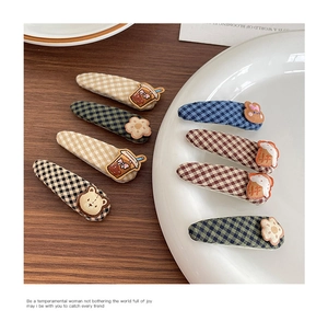 Detail of 8pcs fabric checkered hair clips set with cute cartoon bear and flower patches