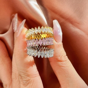 Macro shot of S925 sterling silver marquise-cut rings with pink and white cubic zirconia