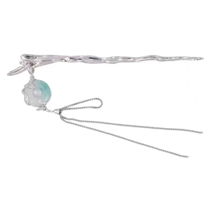 Silver hairpin with green jade pendant and tassels on a clean white background