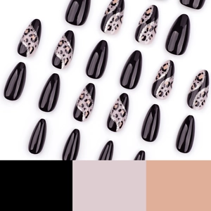 Long almond press-on nails with leopard print, solid black, and silver glitter lines