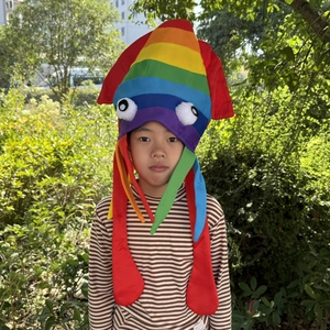 Detail of colorful rainbow octopus plush hat for kids with soft fabric and cute tentacles