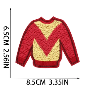 Close-up of red and yellow sweater embroidery patch with 8.5cm x 6.5cm dimension markings