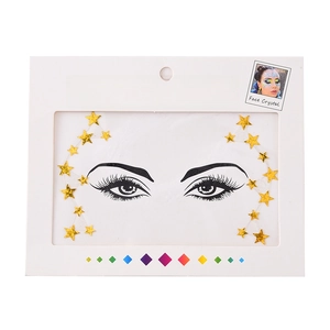 Golden star face crystal stickers in packaging for party makeup and festive body art