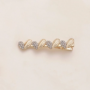 Elegante fermaglio per capelli a cuore dorato con strass brillanti e maglia