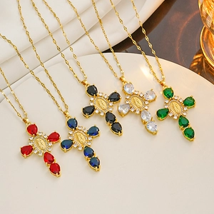 Detailed view of five colorful cross necklaces with Virgin Mary motifs and zircon crystals