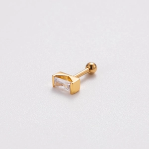 Detail of gold double-headed stud earring featuring a rectangular clear zircon stone