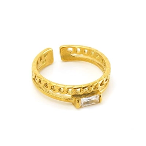 Macro detail of a double-layered gold adjustable ring with zircon stone and chain link