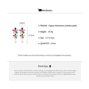 Detailed chart showing flower pearl earrings dimensions of 6.7x2.8cm and materials