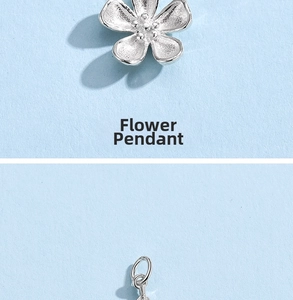 Detail view of 925 silver flower pendant with matte texture and intricate metal loop