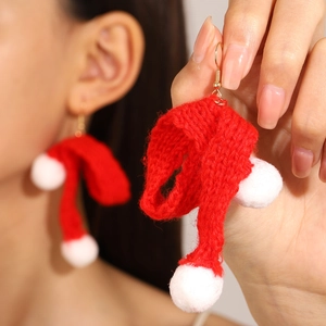 Christmas knit hat earrings in red and white wool for festive winter holiday outfit