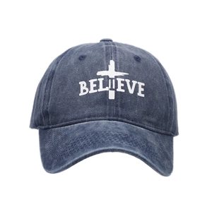 Vintage washed navy blue baseball cap with white Believe text and cross graphic print