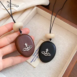 Long Pendant Necklace Wood Acrylic Alloy Oval Saturn Charm Cream Bead Black Cord Retro Minimalist Ethnic Style Women