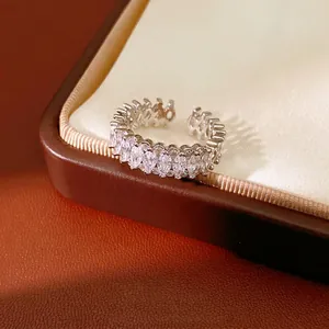 Exquisite silver open ring featuring marquise-cut zircons and wave textured side detailing
