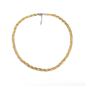 Detail of tricolor woven snake chain in gold silver and rose gold stainless steel
