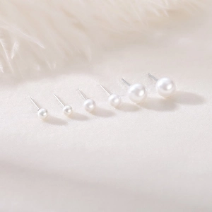 S999 sterling silver pearl stud earrings in various sizes with high-gloss finish
