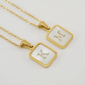 18K gold-plated stainless steel necklace with square shell letter M and K pendants