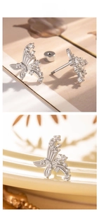 Macro view of butterfly stud earring with sparkling cubic zirconia and screw back
