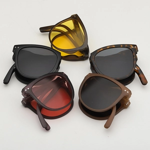 Five assorted colors of foldable UV400 sunglasses with compact frame design and rivets