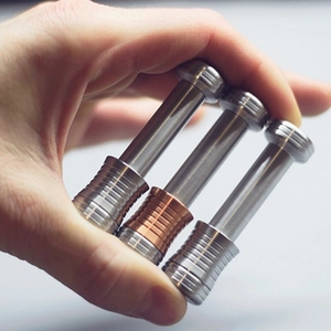 Moondrop kinetic desk toy in silver and copper metal finishes for gravity simulation