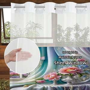 Sheer digital print curtain detail showing grommet top and floral lotus pattern