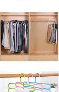 Comparison showing five-tier multi-layered hanger saving five times wardrobe space
