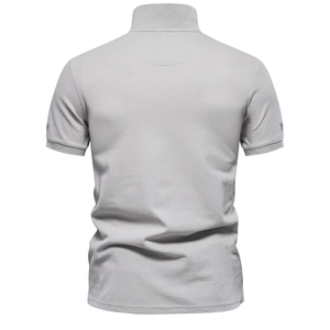 Rear view of light grey slim-fit polo shirt showing breathable piqué cotton mesh texture