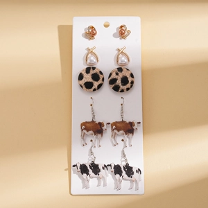 Ten-piece set of minimalist silver needle earrings with heart and cow print patterns