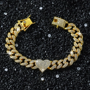 Hip hop style gold plated cuban chain bracelet with iced out heart pendant on black stone