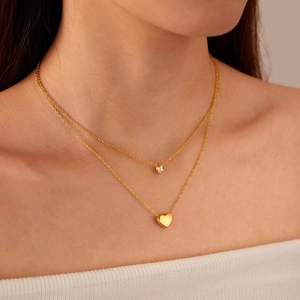 Double-layer gold heart necklace for women featuring a sparkling round zircon pendant